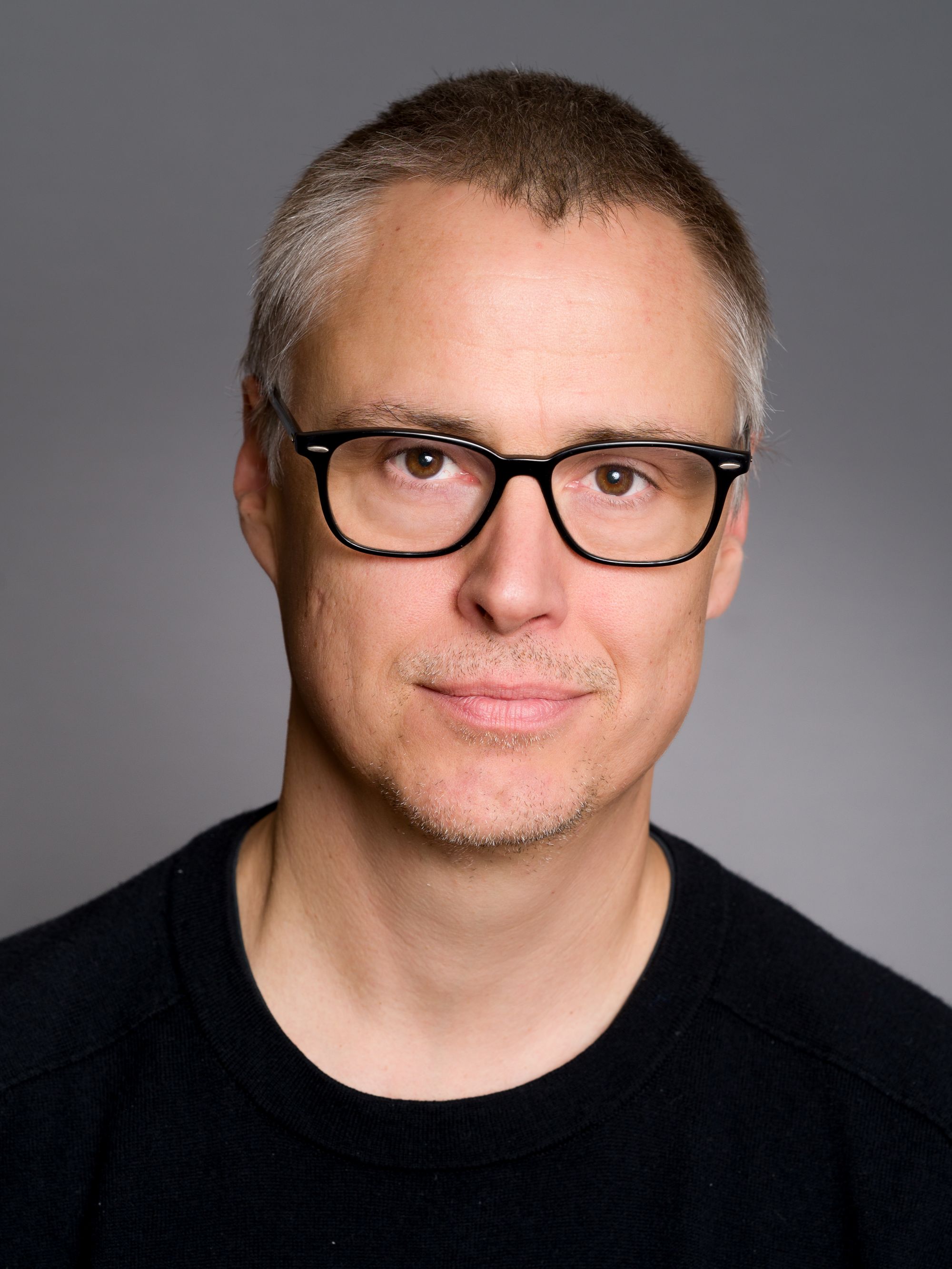 A man wearing glasses