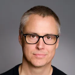 A man wearing glasses