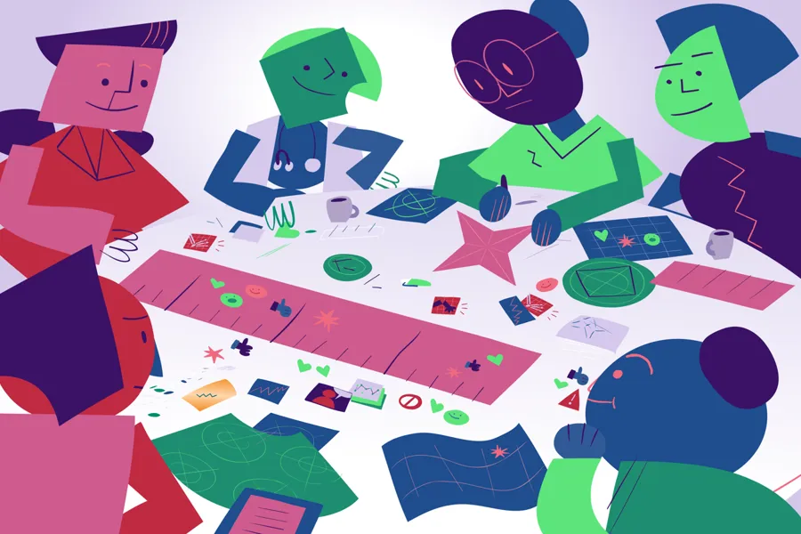 Personer som sitter rundt et bord