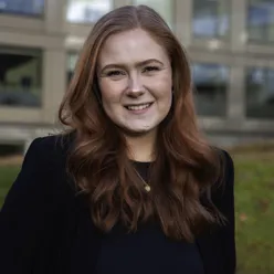 A woman smiling for the camera