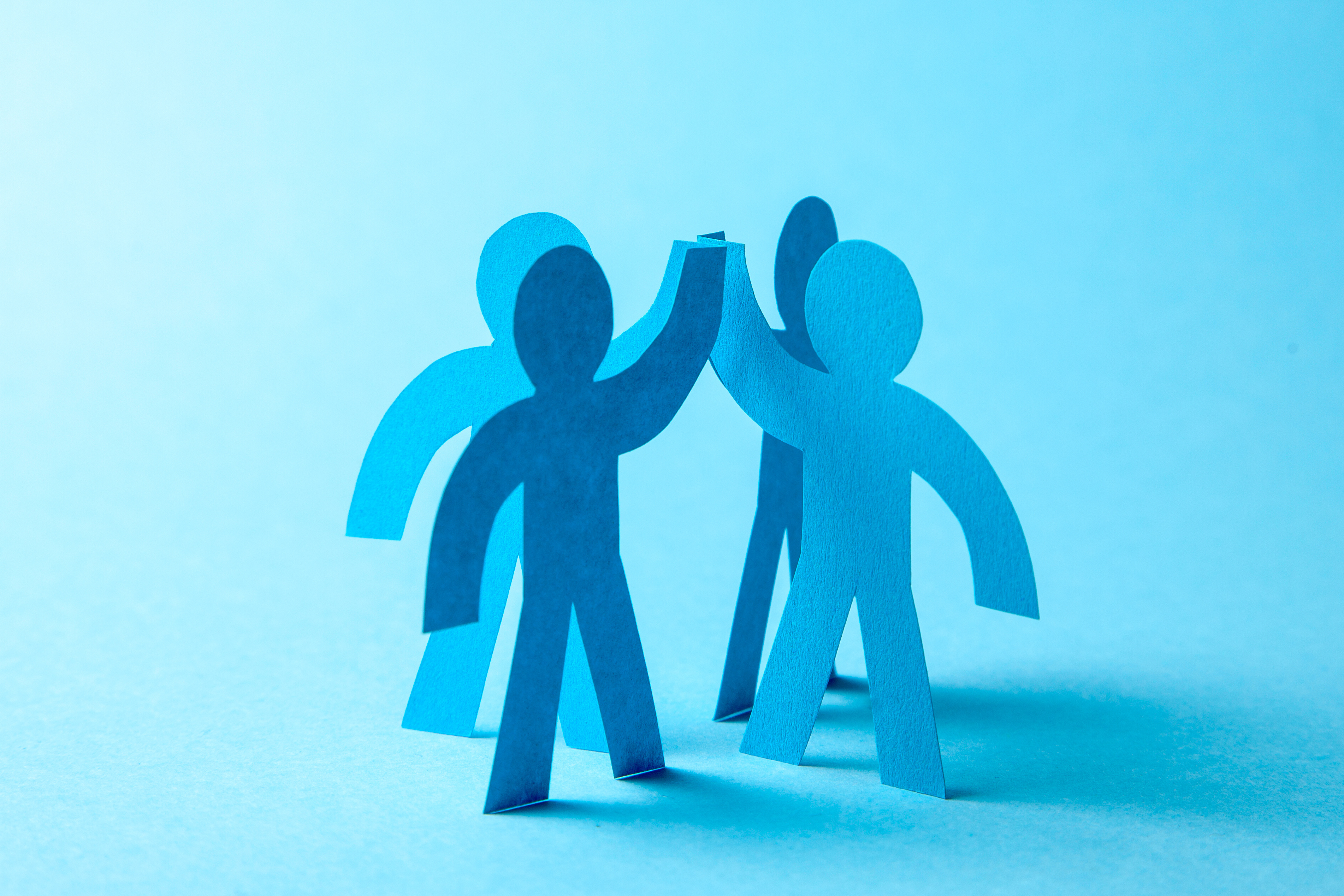 A group of people holding hands