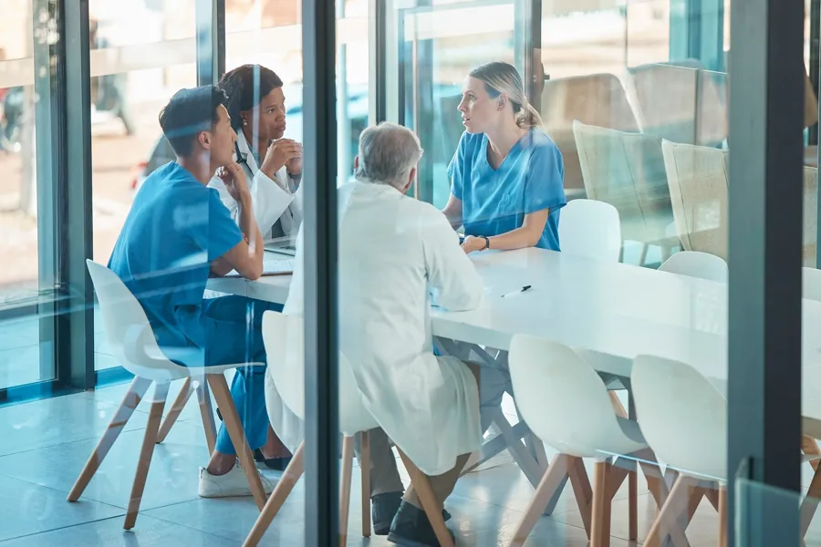 A group of people sitting at a table
