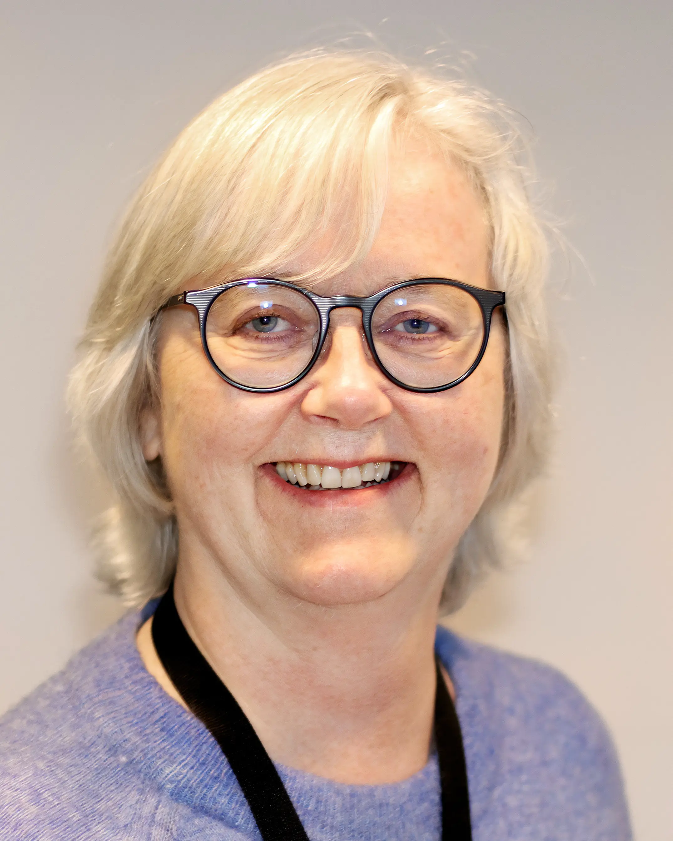 En person med briller