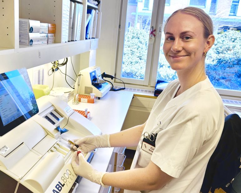 A person in a white coat