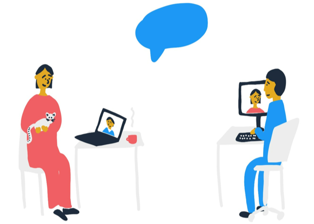 En gruppe mennesker som sitter ved et bord