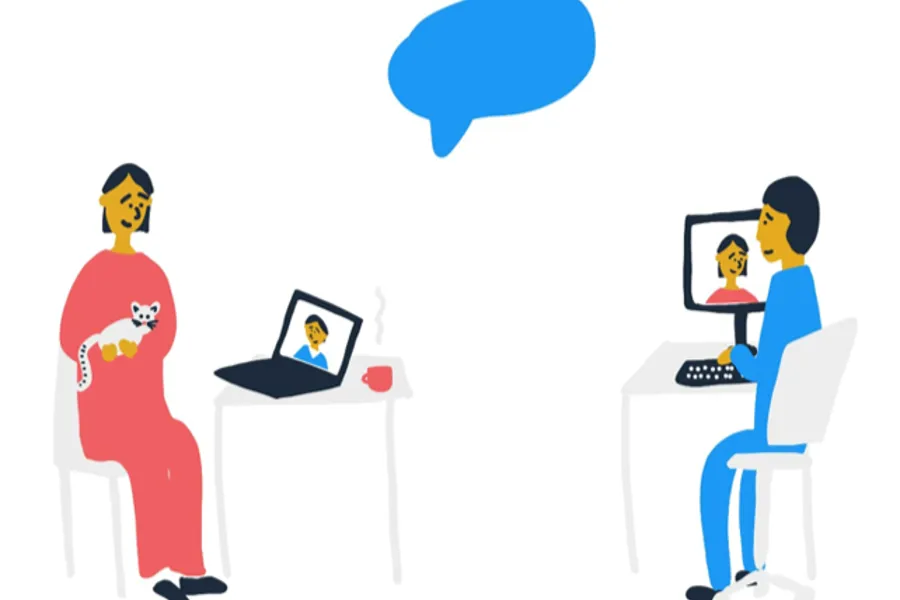 En gruppe mennesker som sitter ved et bord