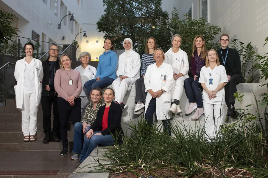 A group of people posing for a photo