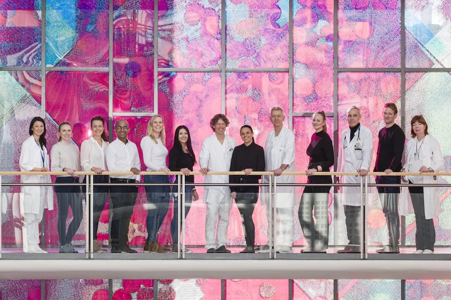 A group of people standing on a stage