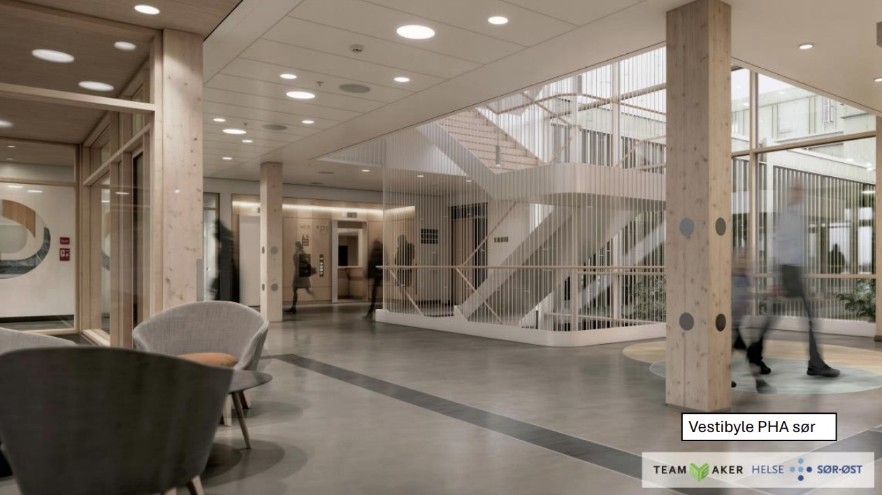 En stor bygning med glassvegger