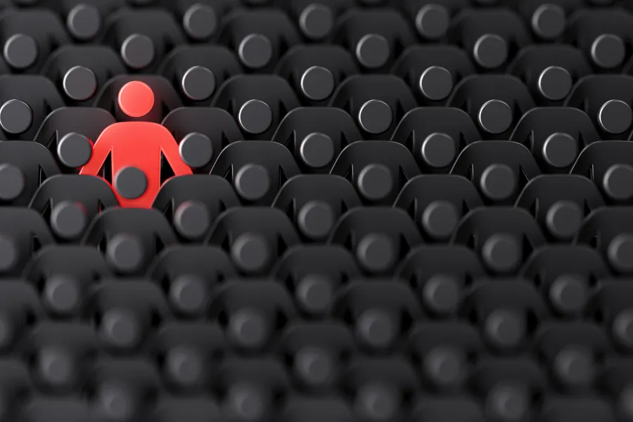 A red ball on a black surface