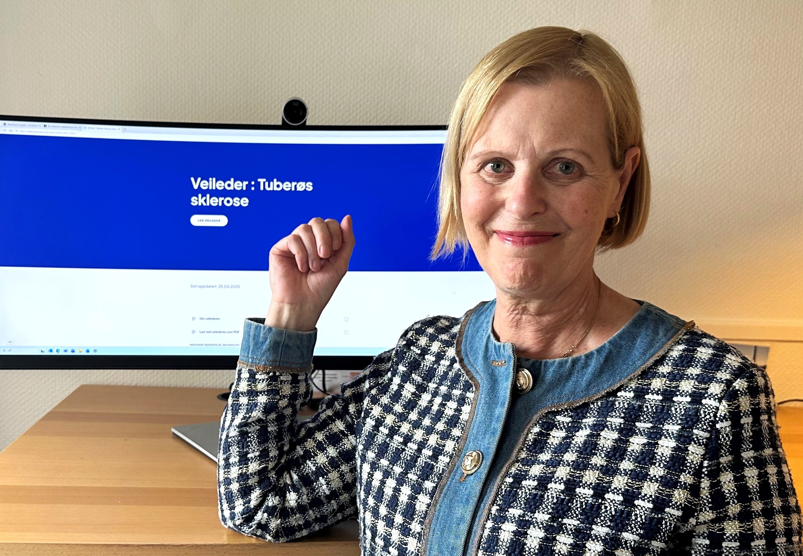 A person in front of a computer screen