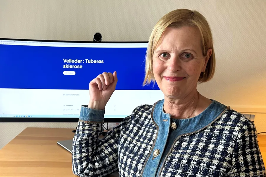 A person in front of a computer screen