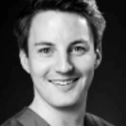 A person smiling for the camera