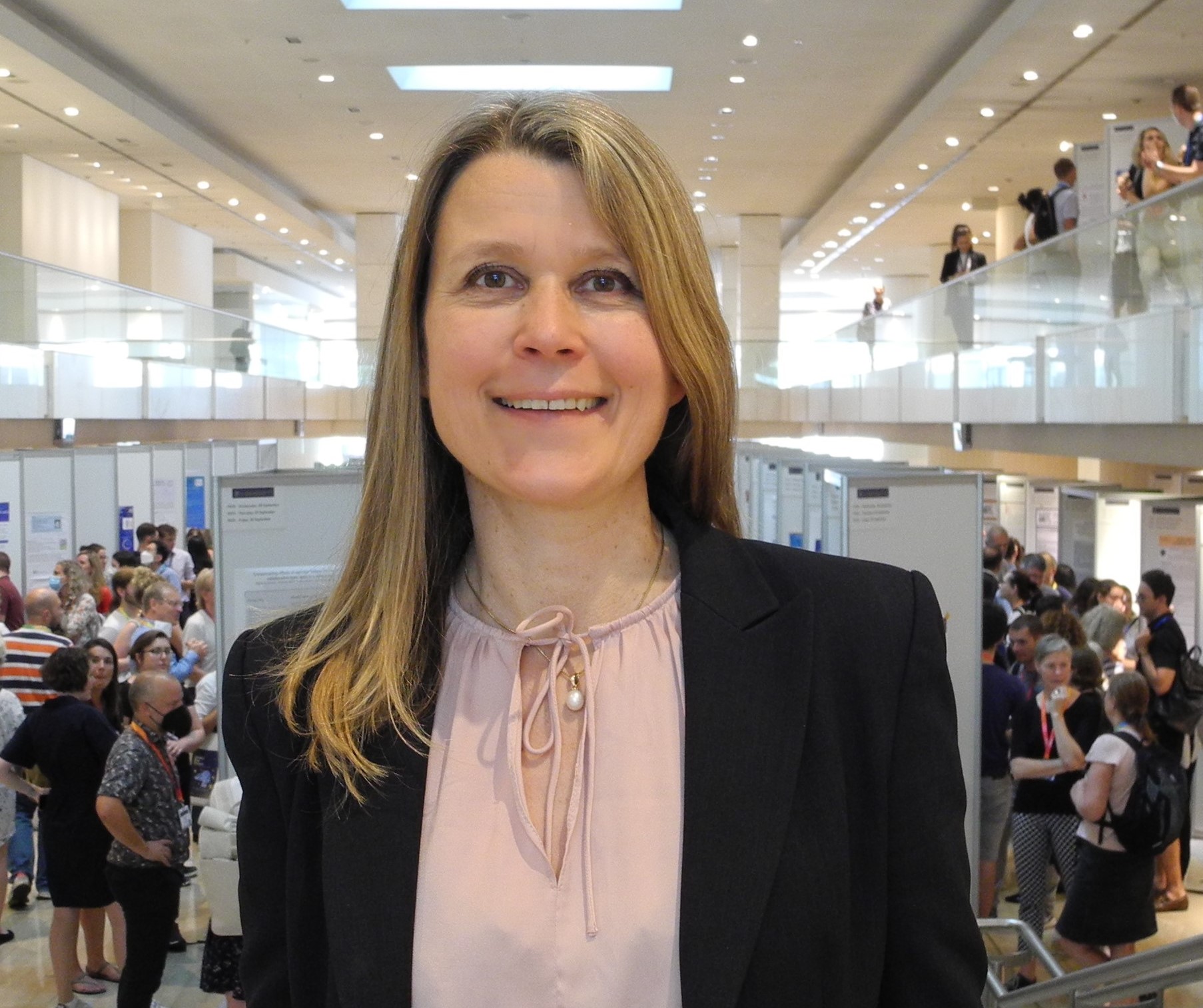 A woman smiling for the camera