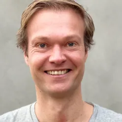 A man smiling for the camera