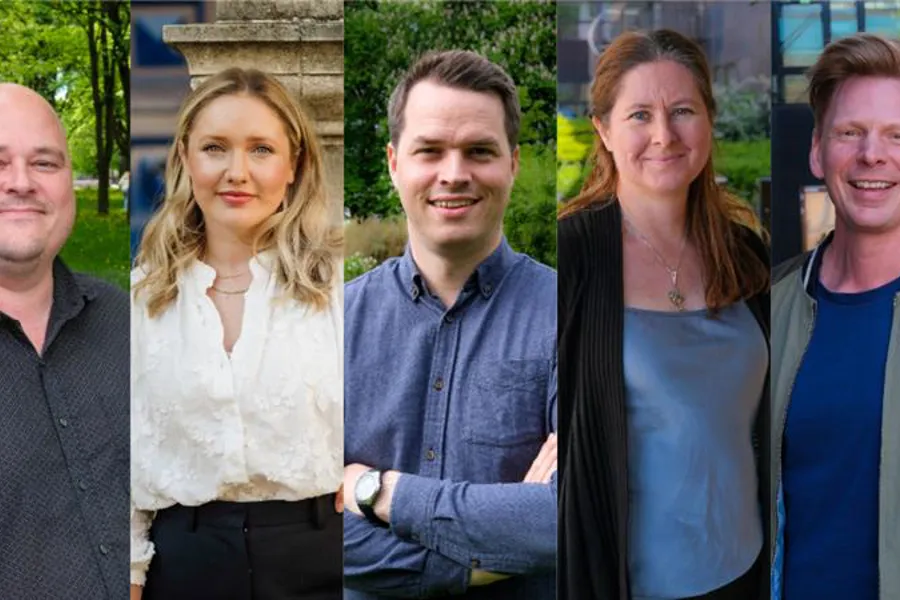 En gruppe mennesker som poserer for et bilde