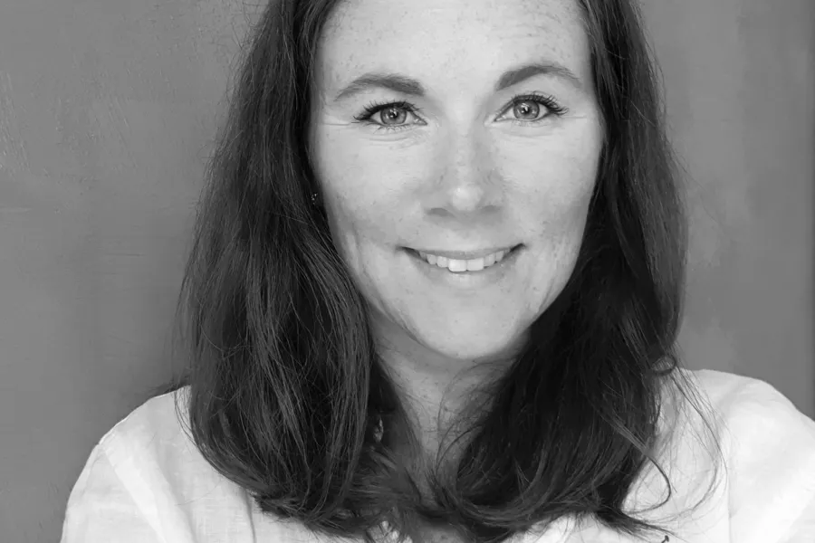 A woman smiling for the camera