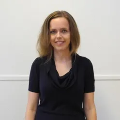 A woman smiling for the camera