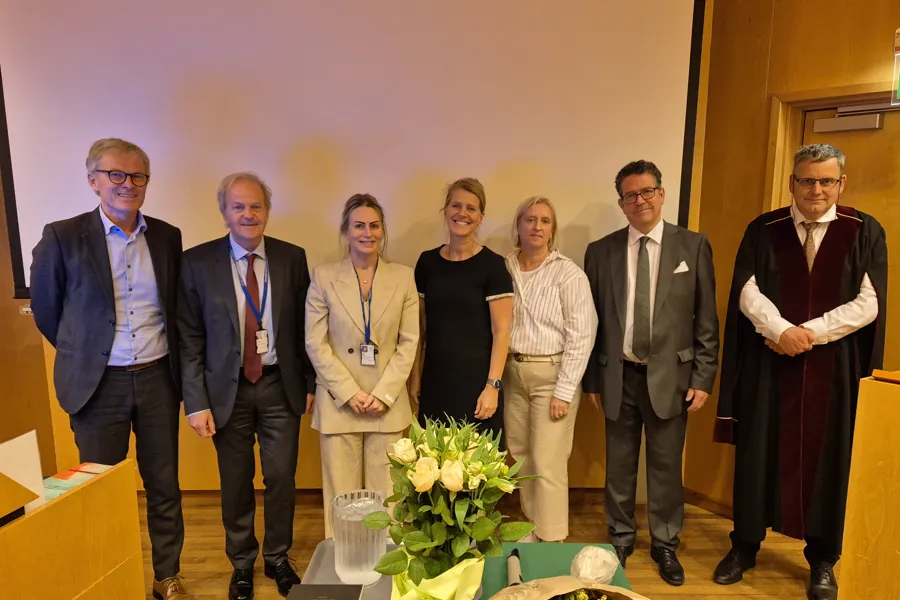 Photo of Jorun Tangen together with supervisors and adjudication committee.