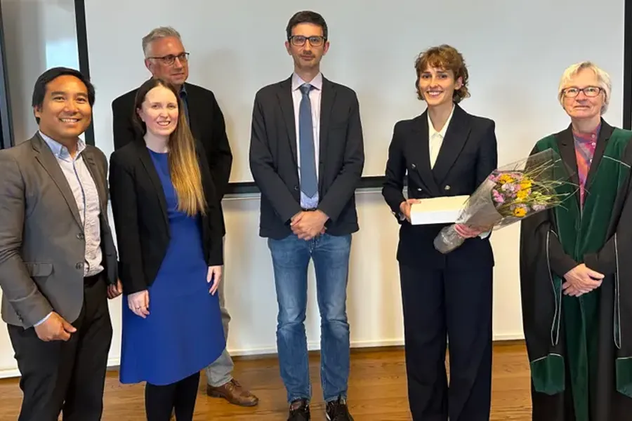 Photo of Lena Myklebust, supervisors and adjudication committee.