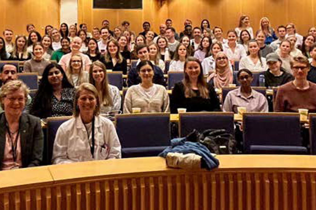 A group of people sitting in a room