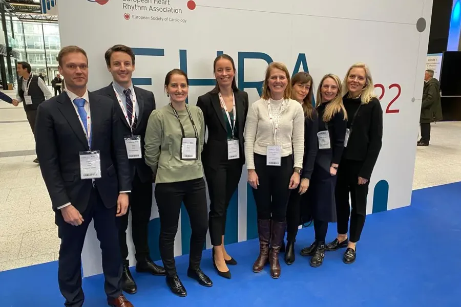 A group of people posing for a photo