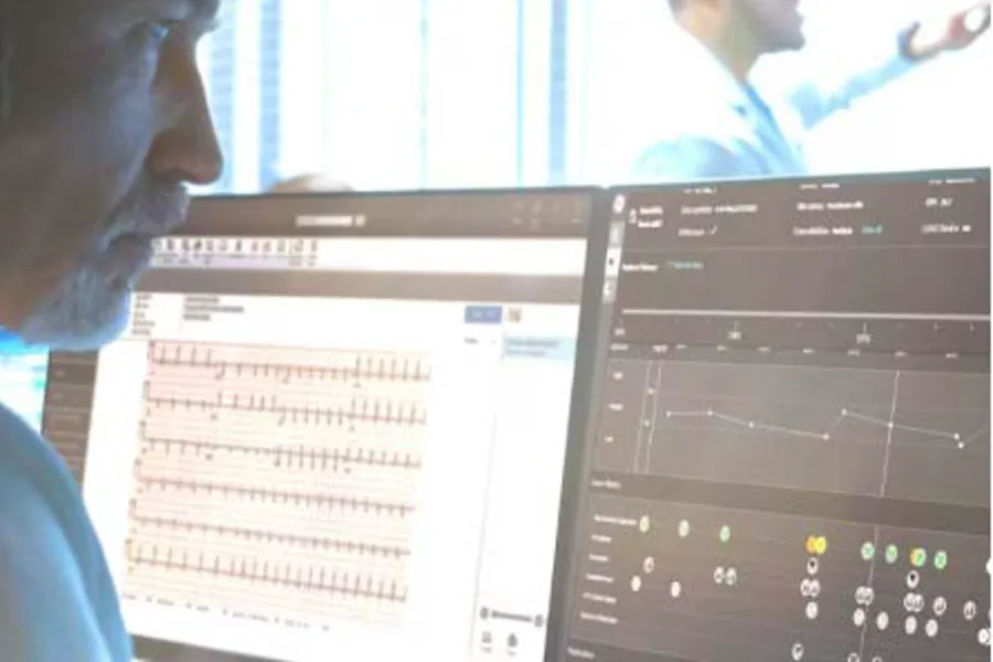 A man looking at a computer screen