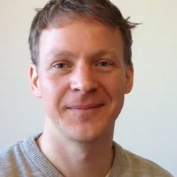 A man smiling for the camera