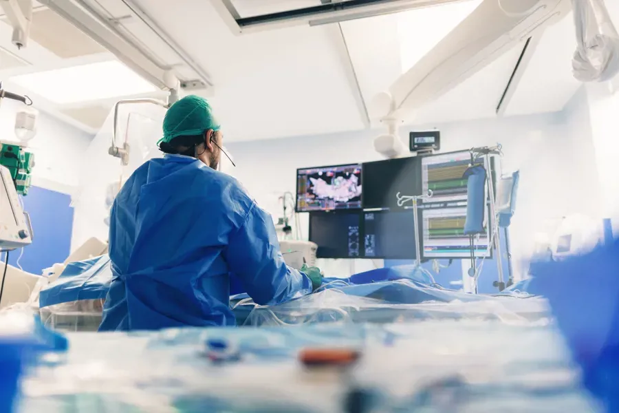 A person in a blue coat