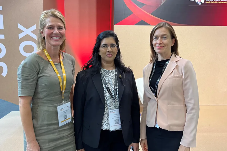 A few women posing for a photo