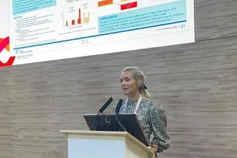 A person standing at a podium