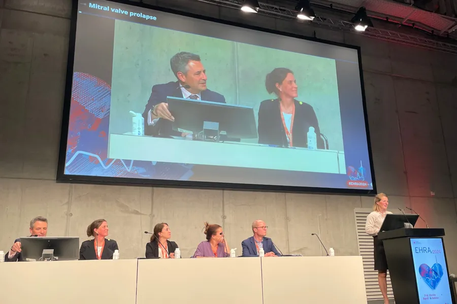 A group of people at a conference