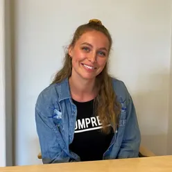 A woman sitting at a table
