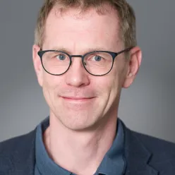 A man wearing glasses