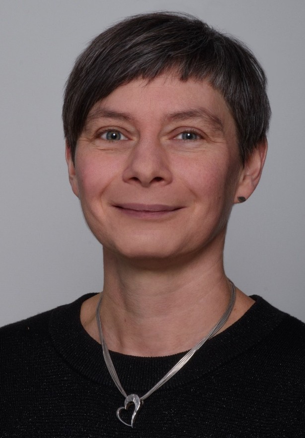 A person wearing a necklace