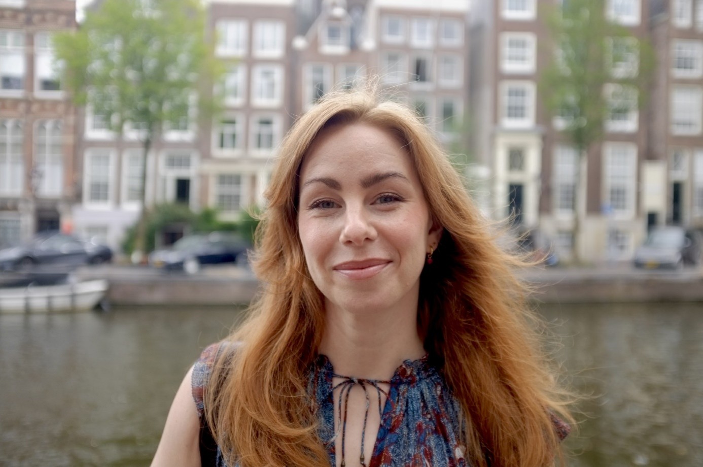 A woman smiling for the camera