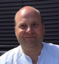 A man smiling for the camera