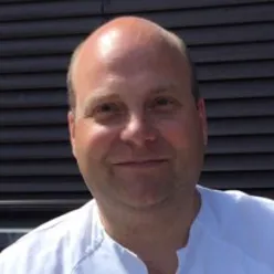 A man smiling for the camera