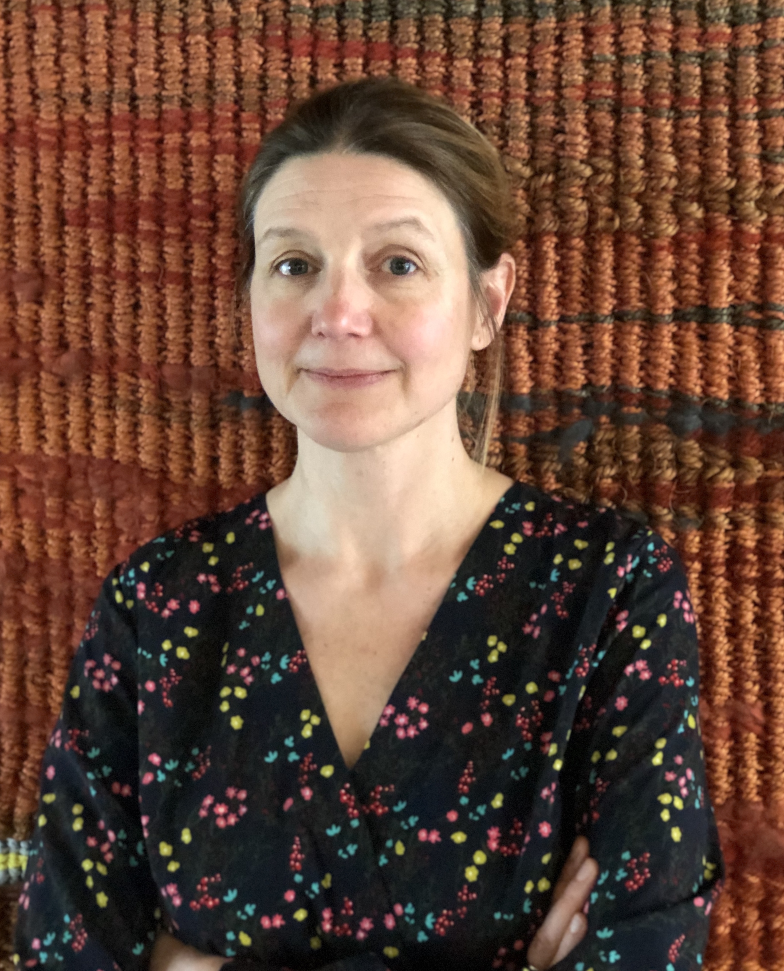 A person with the arms crossed