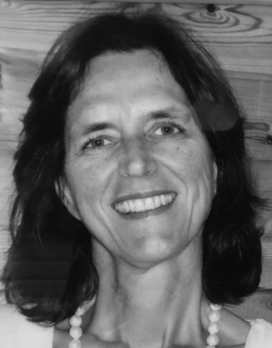 A woman smiling for the camera