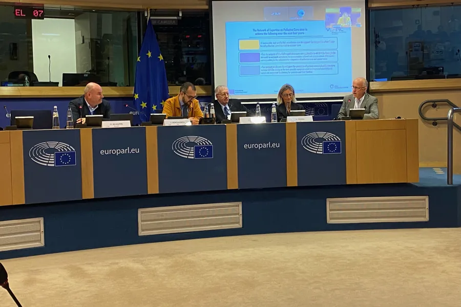 A group of people at a conference