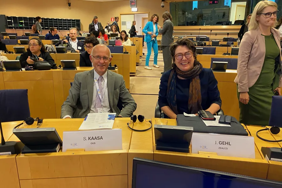 A group of people in a meeting