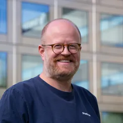 A man wearing glasses