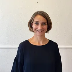 A person smiling for the camera