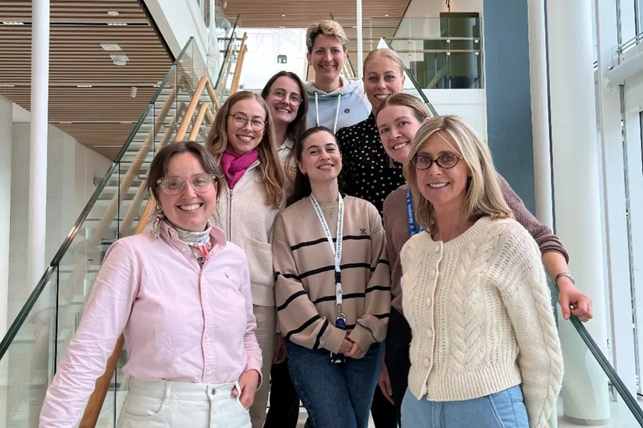 A group of people posing for a photo