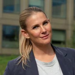 A woman smiling for the camera