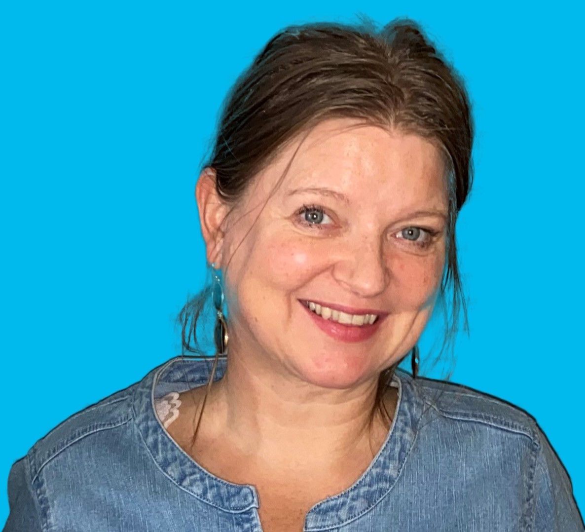 A close-up of a woman smiling