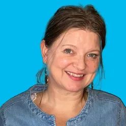 A close-up of a woman smiling
