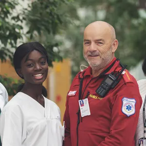 A man and woman smiling