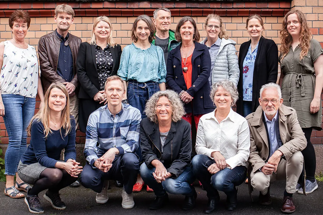 A group of people posing for a photo
